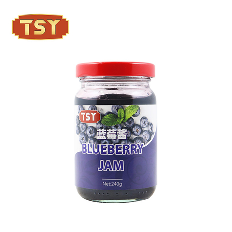 Bottiglia di vetro fresco squisito marmellata di mirtilli fruttati